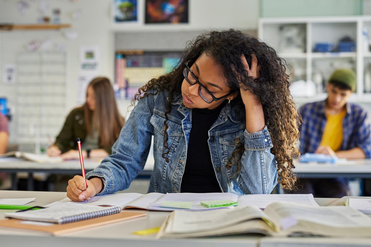 Student with GCSE revision and managing exam stress